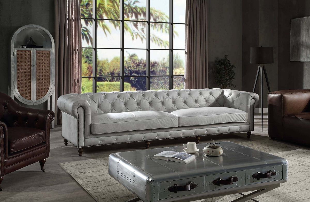 Ofer Vintage Top-Grain Leather Sofa – 122” Antique White Tufted Sofa with Nailhead Trim in modern living room setting.