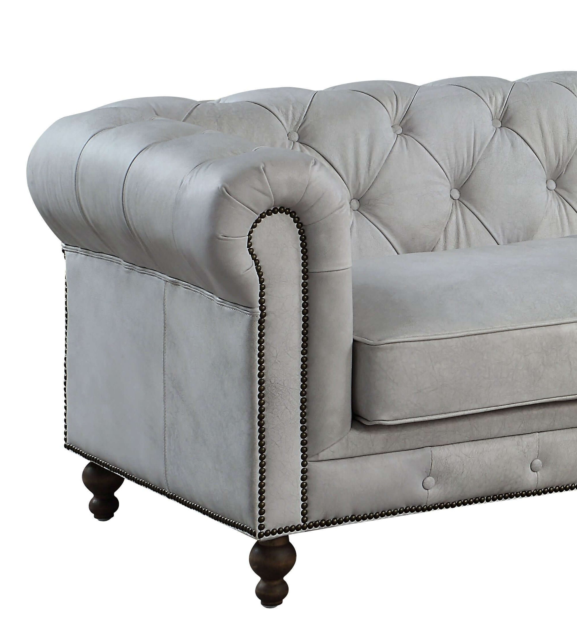Ofer Vintage Top-Grain Leather Sofa – 122” Antique White Tufted Sofa with Nailhead Trim detail with tufted back and nailhead trim.