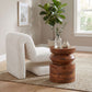 Opam White Corduroy Accent Chair – Modern Sculptural Lounge Chair in a stylish interior setting with wood table and plants.