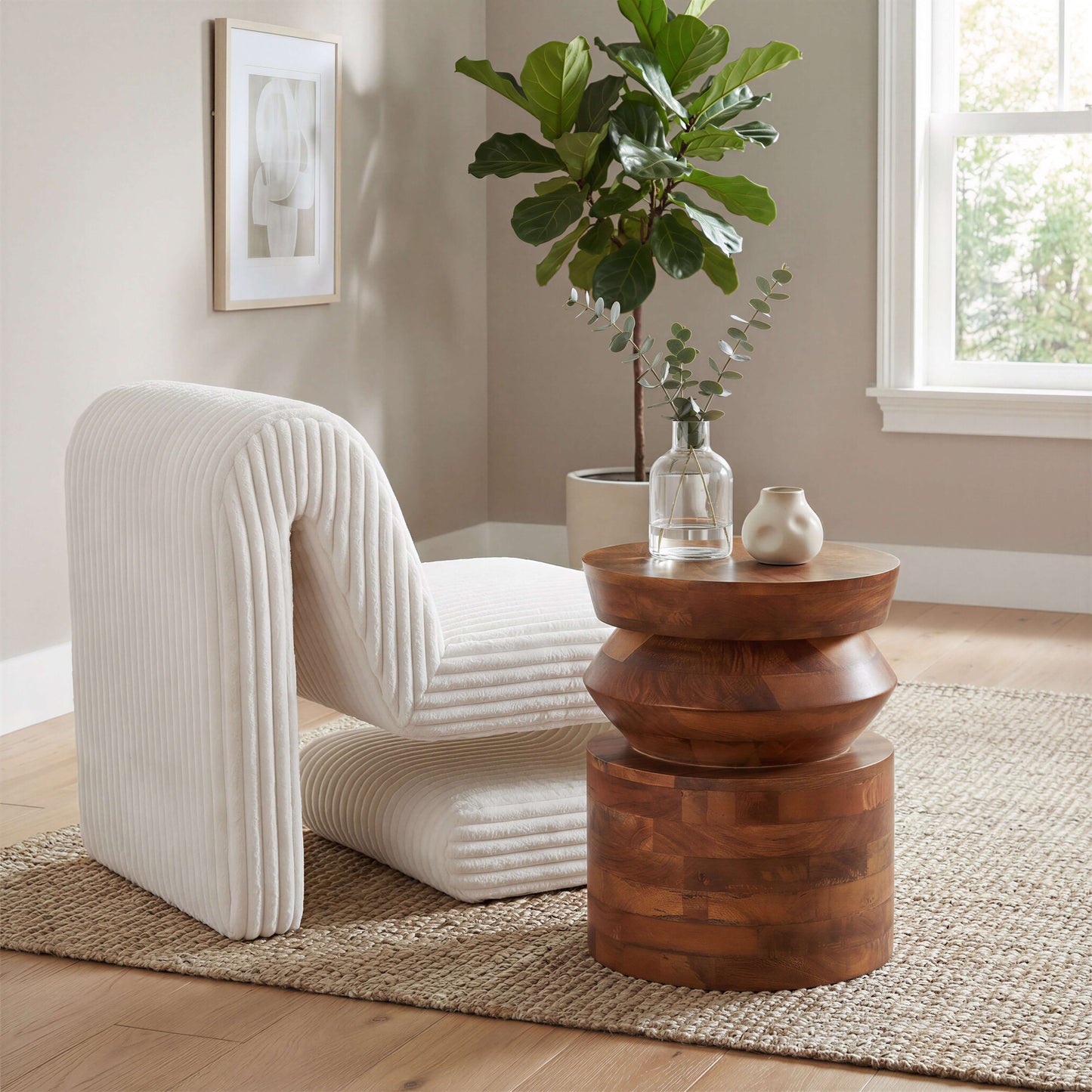 Opam White Corduroy Accent Chair – Modern Sculptural Lounge Chair in a stylish interior setting with wood table and plants.