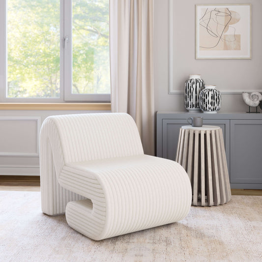 Opam White Corduroy Accent Chair – Modern Sculptural Lounge Chair in a bright interior with minimalist decor.
