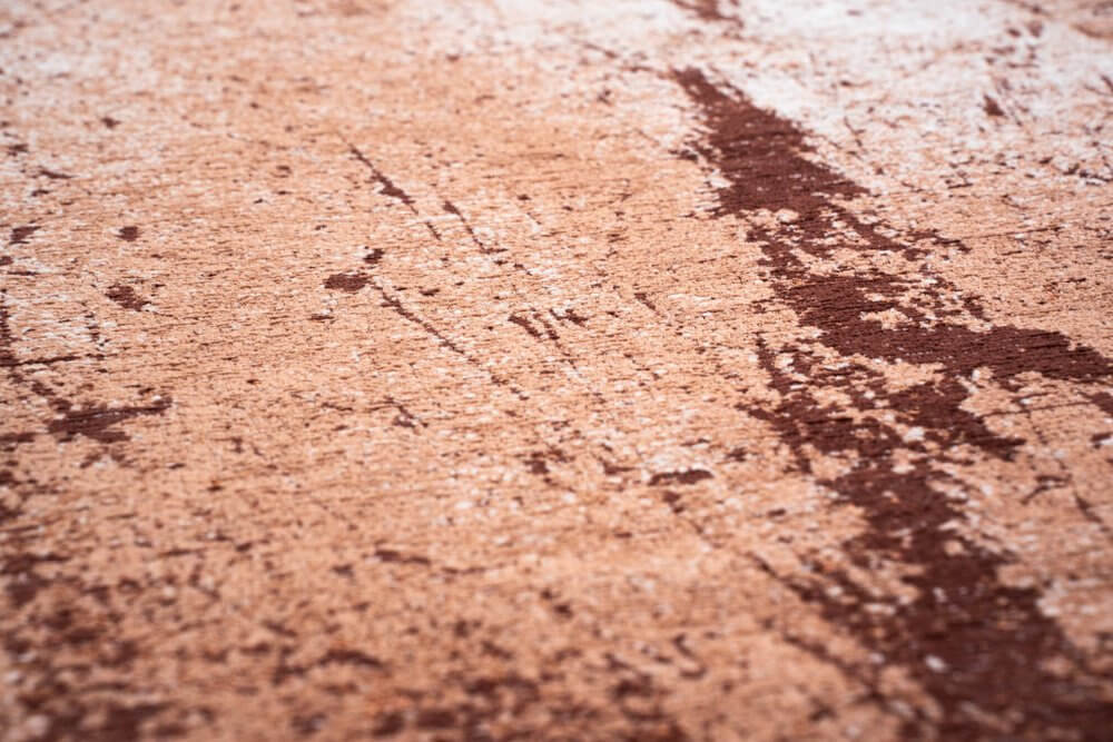 Orange Brown And White Abstract Washable Area Rug With UV Protection Area Rug | 9' x 13' close-up texture view.