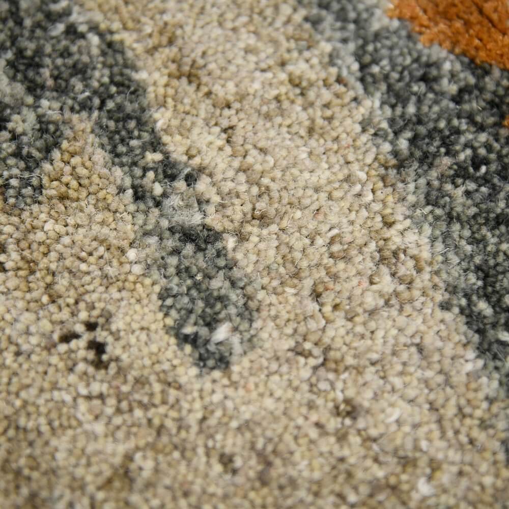 Orange Ivory And Green Wool Abstract Hand Tufted Area Rug | 9' x 13' close-up texture detail.
