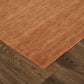 Orange Wool Hand Woven Area Rug | 9' x 13' with rich texture on warm flooring.