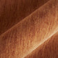 Close-up of texture of Orange Wool Hand Woven Area Rug | 9' x 13', showcasing warmth and durability.