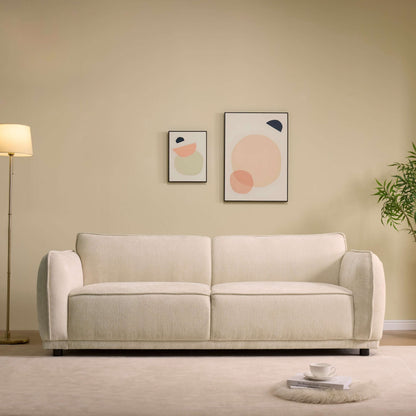 Oslo Boucle Sofa – 84” Round Arm Modern 3-Seater Couch (Beige Upholstered) in a stylish living room setting.