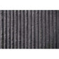 Textured gray corduroy fabric close-up, highlighting the vertical ribbed pattern.