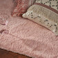 Pink Shag Hand Woven Area Rug | 9' x 13' with a decorative pillow and glass, showcasing soft texture and comfort.