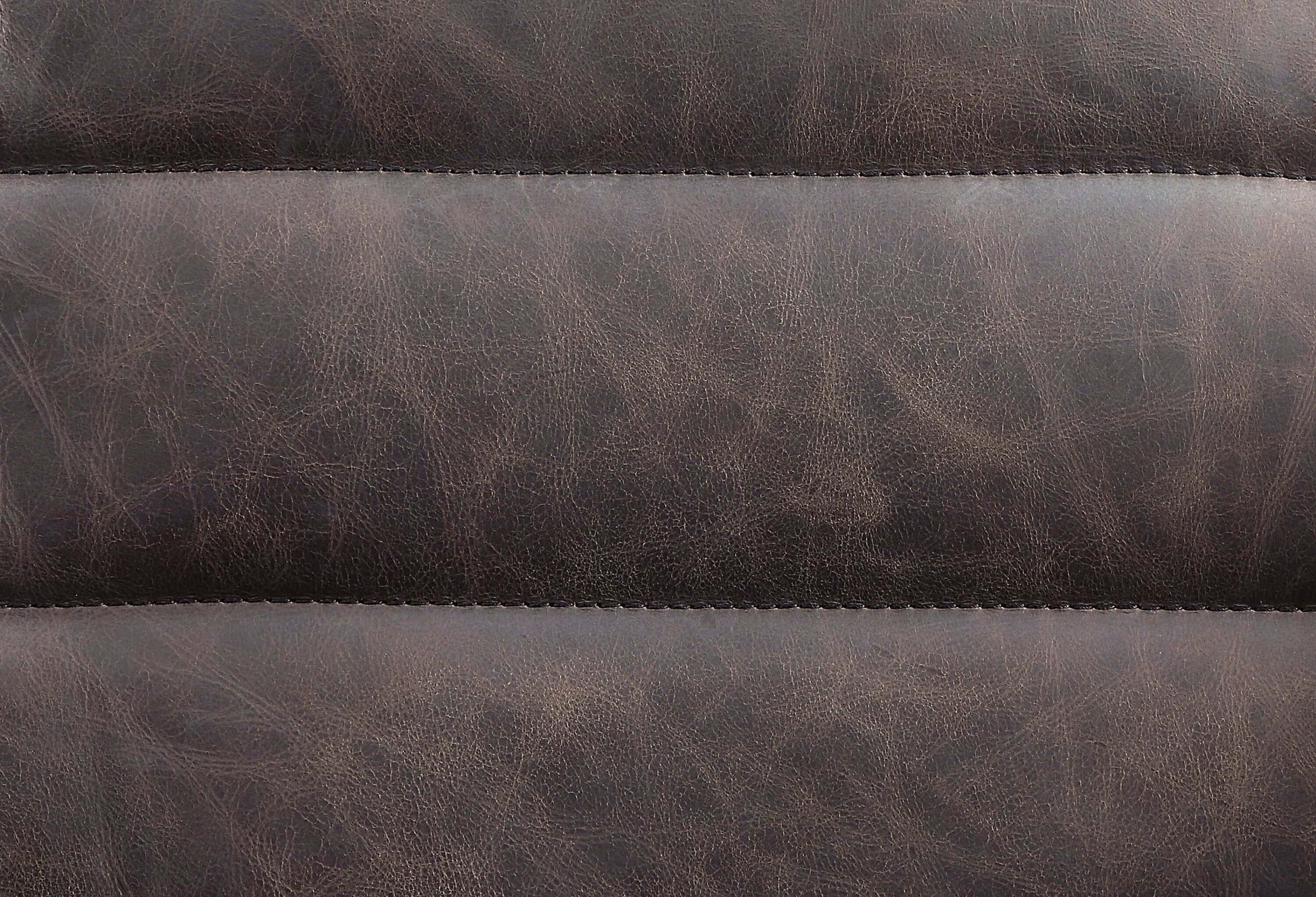 Pipino Top-Grain Ebony Leather Swivel Chair – Modern Accent Chair close-up of luxurious ebony leather upholstery.