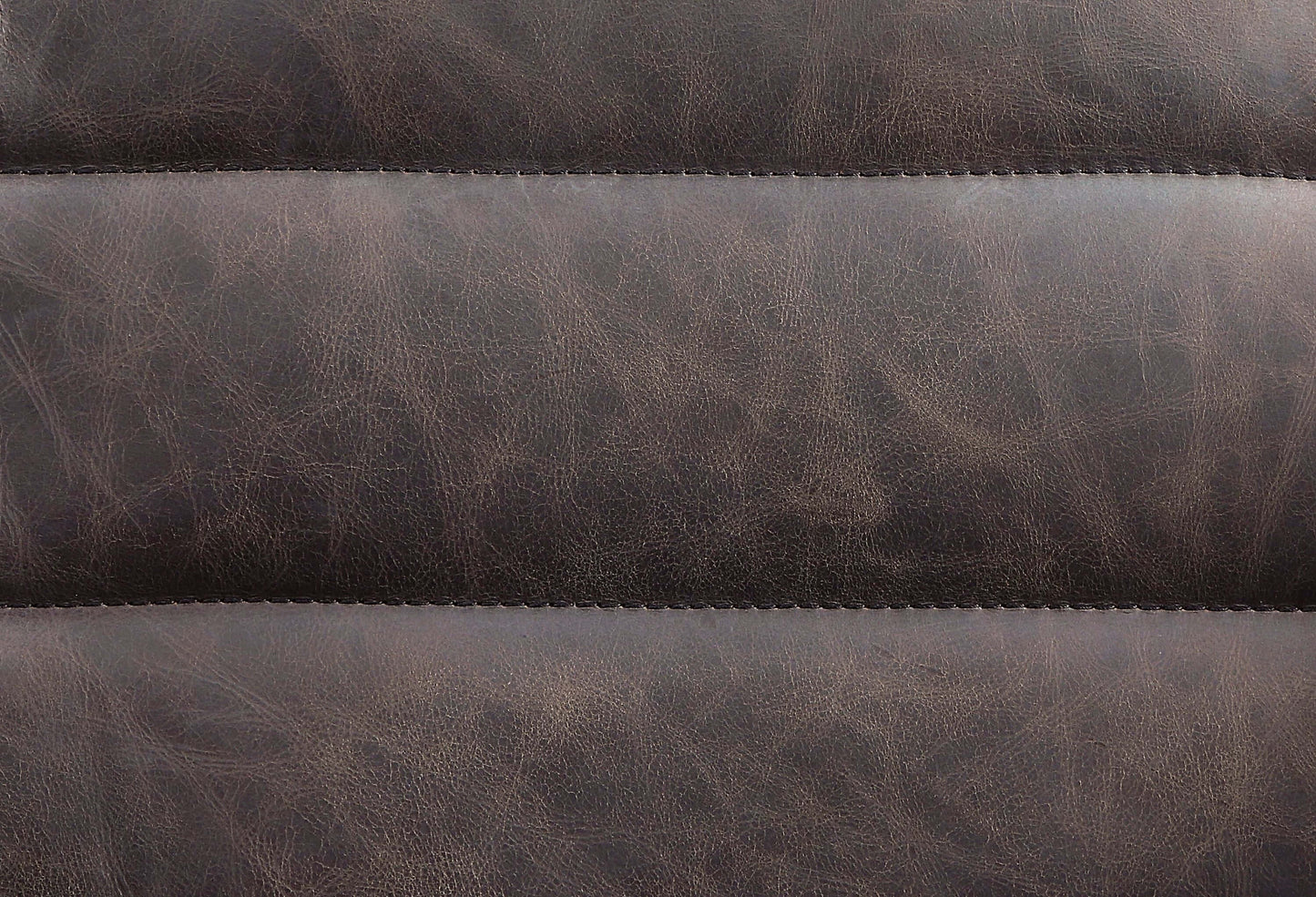 Pipino Top-Grain Ebony Leather Swivel Chair – Modern Accent Chair close-up of luxurious ebony leather upholstery.