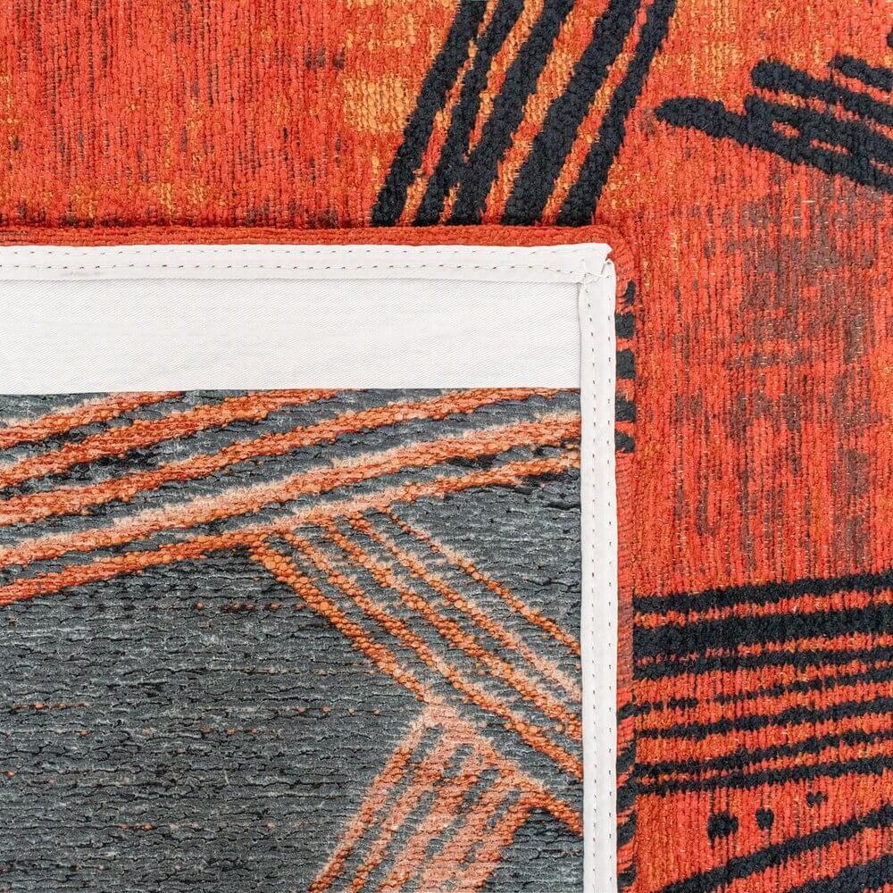 Red And White Abstract Washable Area Rug With UV Protection Area Rug | 9' x 13' close-up showing the design and edge details.