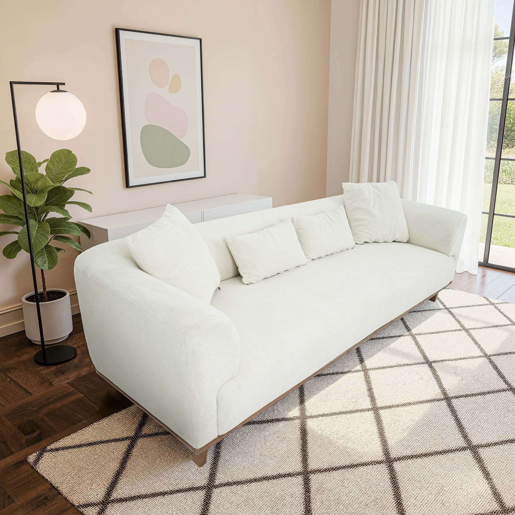 Richardson Velvet Sofa 103” - Scandinavian Modern 3-Seat Sofa with Wood Base in a modern living room setting.