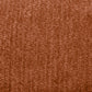 Fabric swatch of modern curved sectional sofa in warm brown texture, showcasing soft, comfortable upholstery.