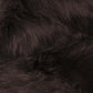 Close-up of soft, luxurious dark faux fur, showcasing the plush texture of a sleek shag rug.