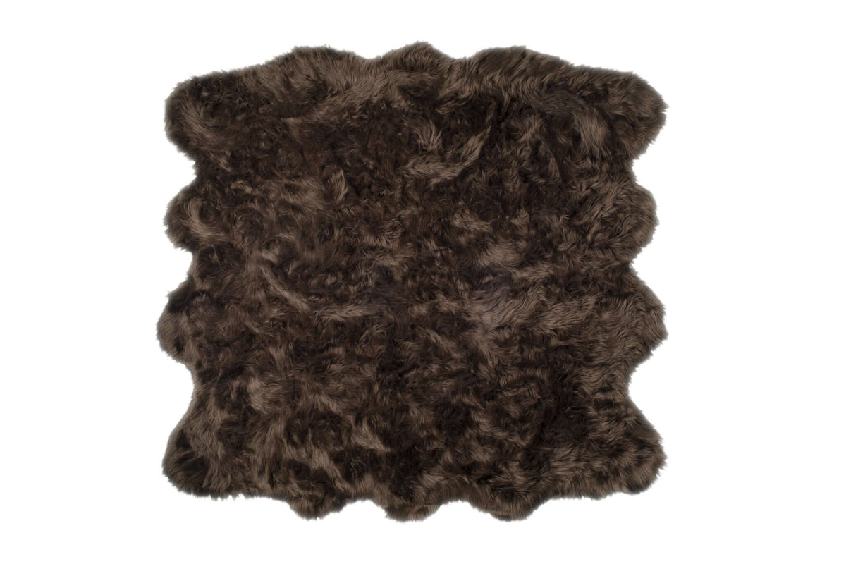 Scalloped faux fur shag rug in dark brown, 6' x 6', perfect for adding warmth and style to modern decor.