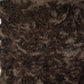 Soft brown shag rug close-up, featuring luxurious faux fur texture, ideal for modern home decor.