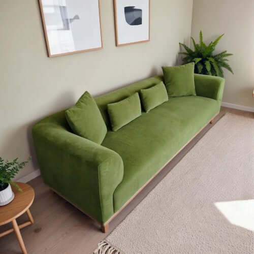 Richardson Velvet Sofa 103” - Scandinavian Modern 3-Seat Sofa with Wood Base in green upholstery.