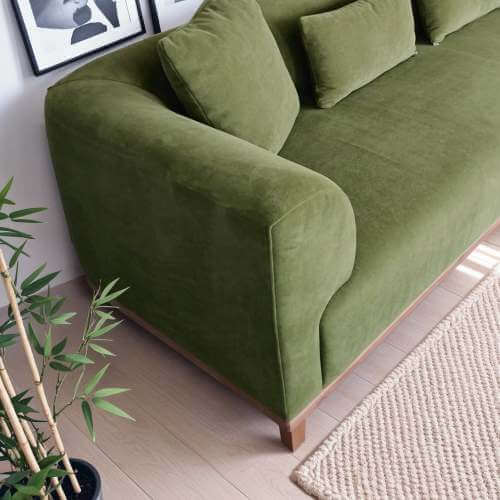 Richardson Velvet Sofa 103” - Scandinavian Modern 3-Seat Sofa with Wood Base in soft green velvet with plush pillows.