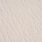 Close-up view of soft, textured white chenille fabric, ideal for the Boneless Modular Chenille Sectional Sofa – 99” Curved Chaise Compression Couch (White).
