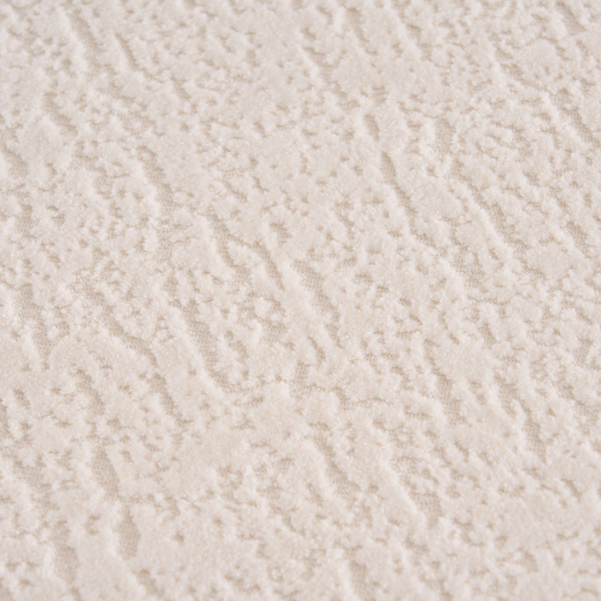 Close-up view of soft, textured white chenille fabric, ideal for the Boneless Modular Chenille Sectional Sofa – 99” Curved Chaise Compression Couch (White).