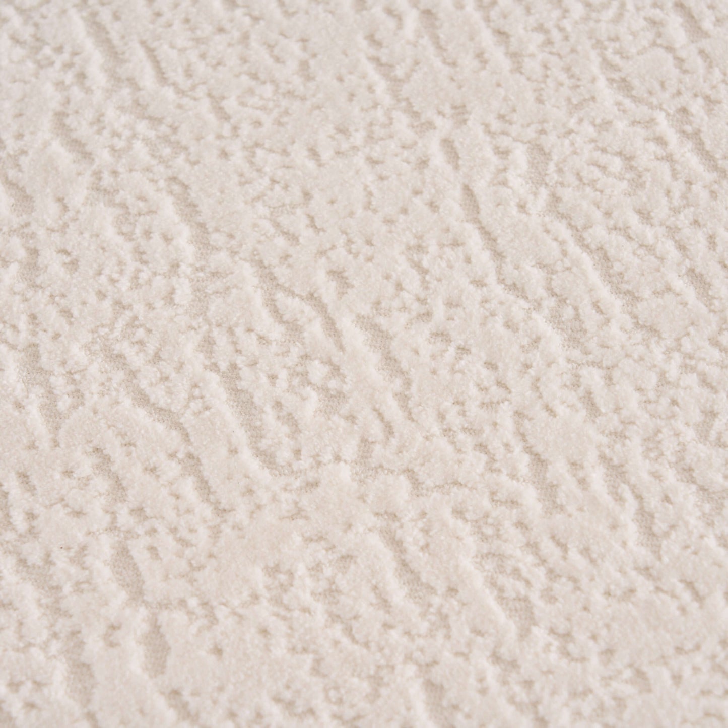 Close-up view of soft, textured white chenille fabric, ideal for the Boneless Modular Chenille Sectional Sofa – 99” Curved Chaise Compression Couch (White).