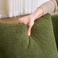 Person holding a plush green pillow showcasing the soft texture of the Boneless Modular Chenille Sectional Sofa – 99” Curved Chaise Compression Couch (White).