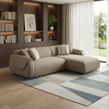 Taupe Boucle L Shaped Two Piece Sofa and Chaise Sectional With Toss Pillows in modern living room setting.