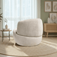 Thornton Chenille Swivel Chair – Barrel Swivel Accent Chair (Gold or Sand) in a cozy living room setting.