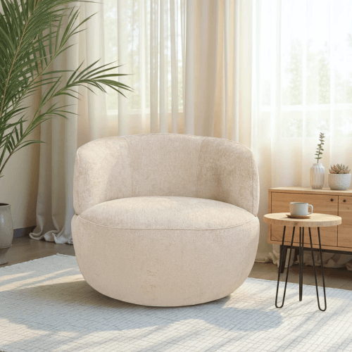 Thornton Chenille Swivel Chair – Barrel Swivel Accent Chair (Gold or Sand) in a cozy living room setting.