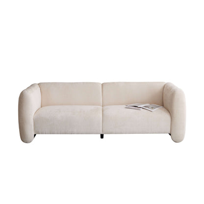 Tonson Boucle Sofa – 83” Curved Wave 3-Seater Sofa (3 Colors, Modern Sculptural Design) in soft beige fabric.