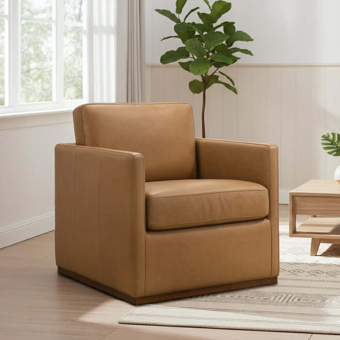 Darien Top-Grain Buffalo Leather Chair in a stylish living room setting with natural light.