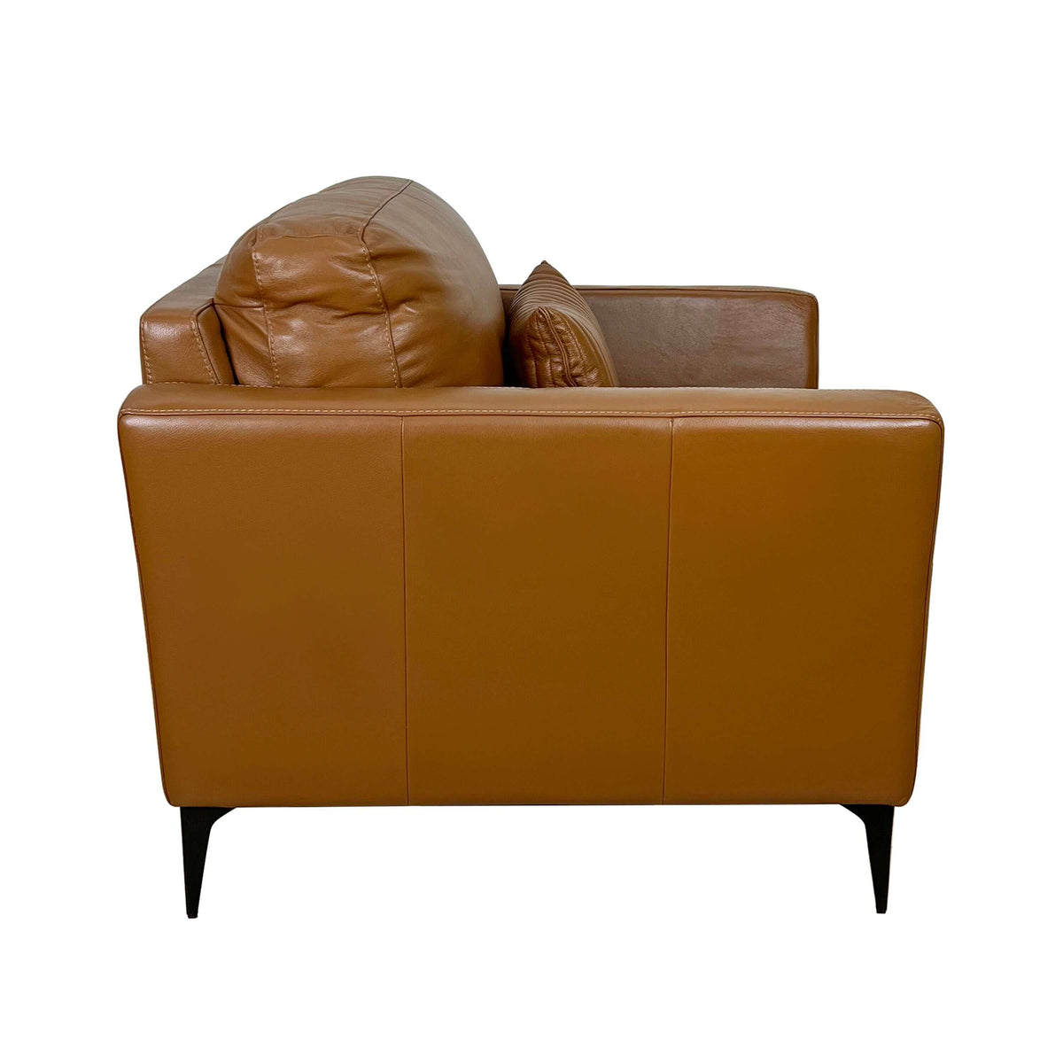Tussio Saddle Tan Leather Chair – Italian Modern Accent Chair with Pillow in soft, warm leather upholstery.