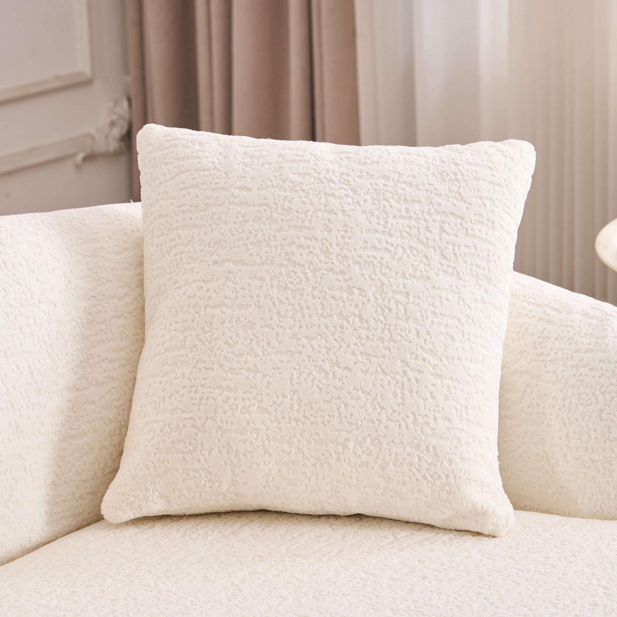 A plush white pillow on the Boneless Modular Chenille Sectional Sofa – 99” Curved Chaise Compression Couch (White).