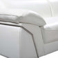 Close-up of the White Italian Leather L Shaped Two Piece Sofa and Chaise Sectional showcasing premium leather and silver metal legs.