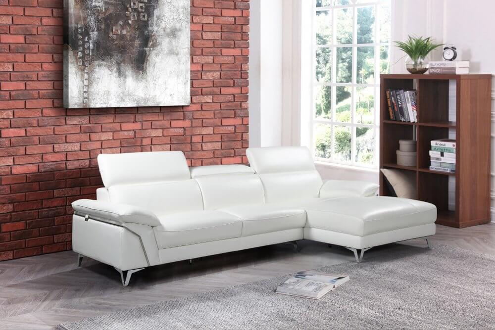 White Italian Leather L Shaped Two Piece Sofa and Chaise Sectional in modern living room setting.