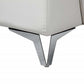 Close-up of the silver metal leg on the White Italian Leather L Shaped Two Piece Sofa and Chaise Sectional.