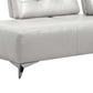 White Leather L Shaped Two Piece Seating Component close-up with modern chrome legs.