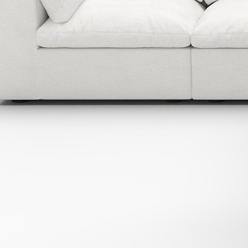 White Linen Blend Modular L Shaped Five Piece Corner Sectional with plush cushions and a modern design.