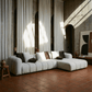 White Sectional Sofa w/ 8 Pillows – Oversized Modern Chaise Couch (145”) in a stylish living room setting.