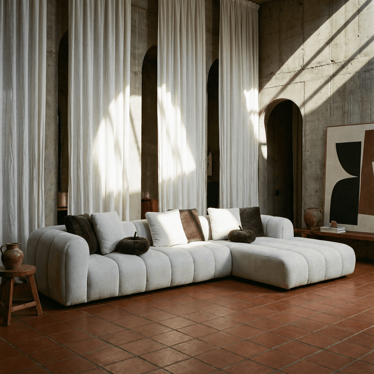 White Sectional Sofa w/ 8 Pillows – Oversized Modern Chaise Couch (145”) in a stylish living room setting.