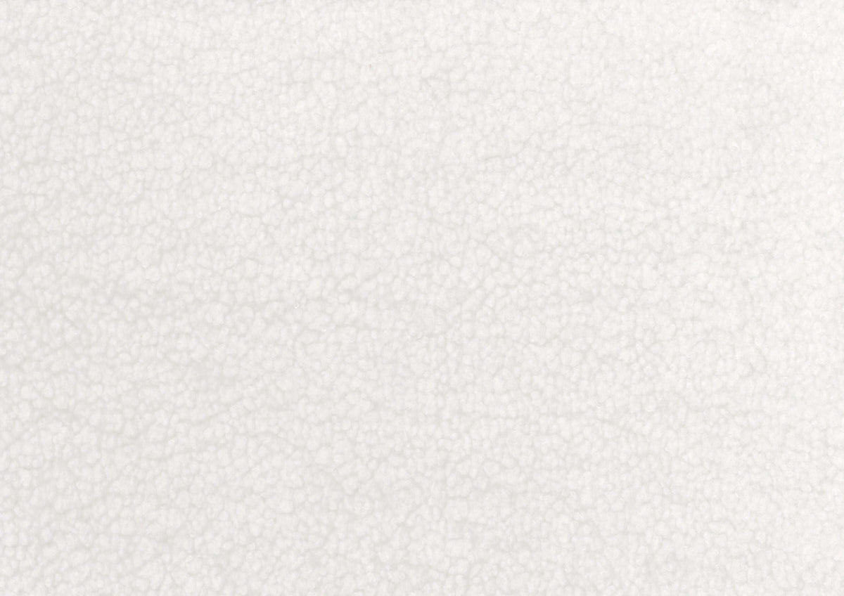 Close-up of white sherpa fabric texture, showcasing its soft and cozy appearance.