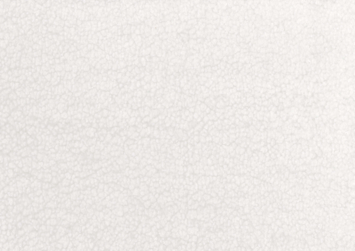 Close-up of white sherpa fabric texture, showcasing its soft and cozy appearance.