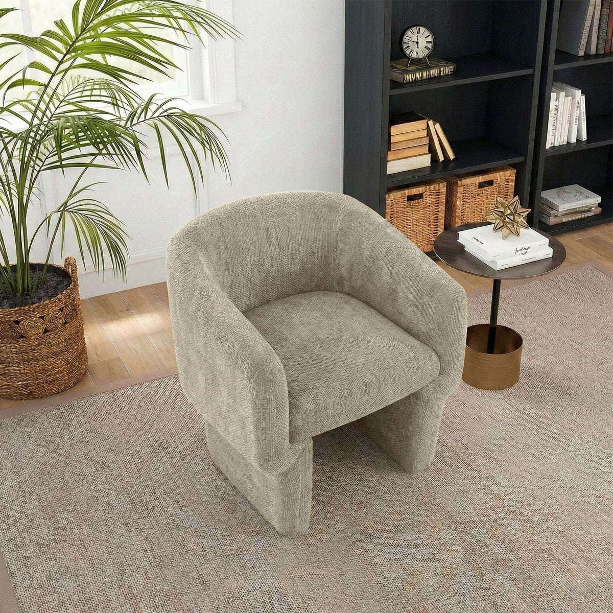 Wichita Chenille Lounge Chair – Modern Curved Accent Chair (Brown or Gold) in cozy living room setting.