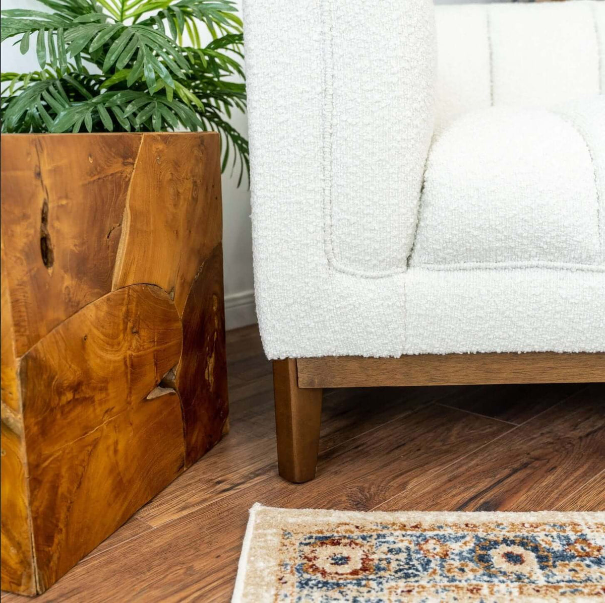 Modern Channel Tufted Fabric Sofa 90” – Melissa MCM Boucle or Velvet Couch (3 Colors) with wooden side table and plant.