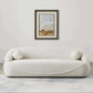 Modern Curved Boucle Sofa 84” (3 Colors) – Andrew Minimalist Sculptural Couch in a stylish living room setting.