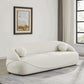 Modern Curved Boucle Sofa 84” (3 Colors) – Andrew Minimalist Sculptural Couch in a stylish living room setting.