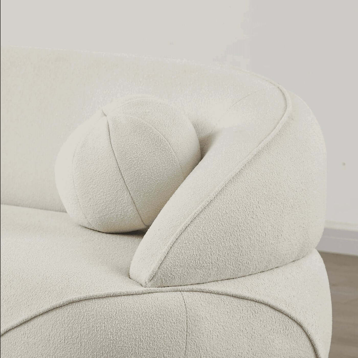 Modern Curved Boucle Sofa 84” (3 Colors) – Andrew Minimalist Sculptural Couch with plush arm and rounded pillow.