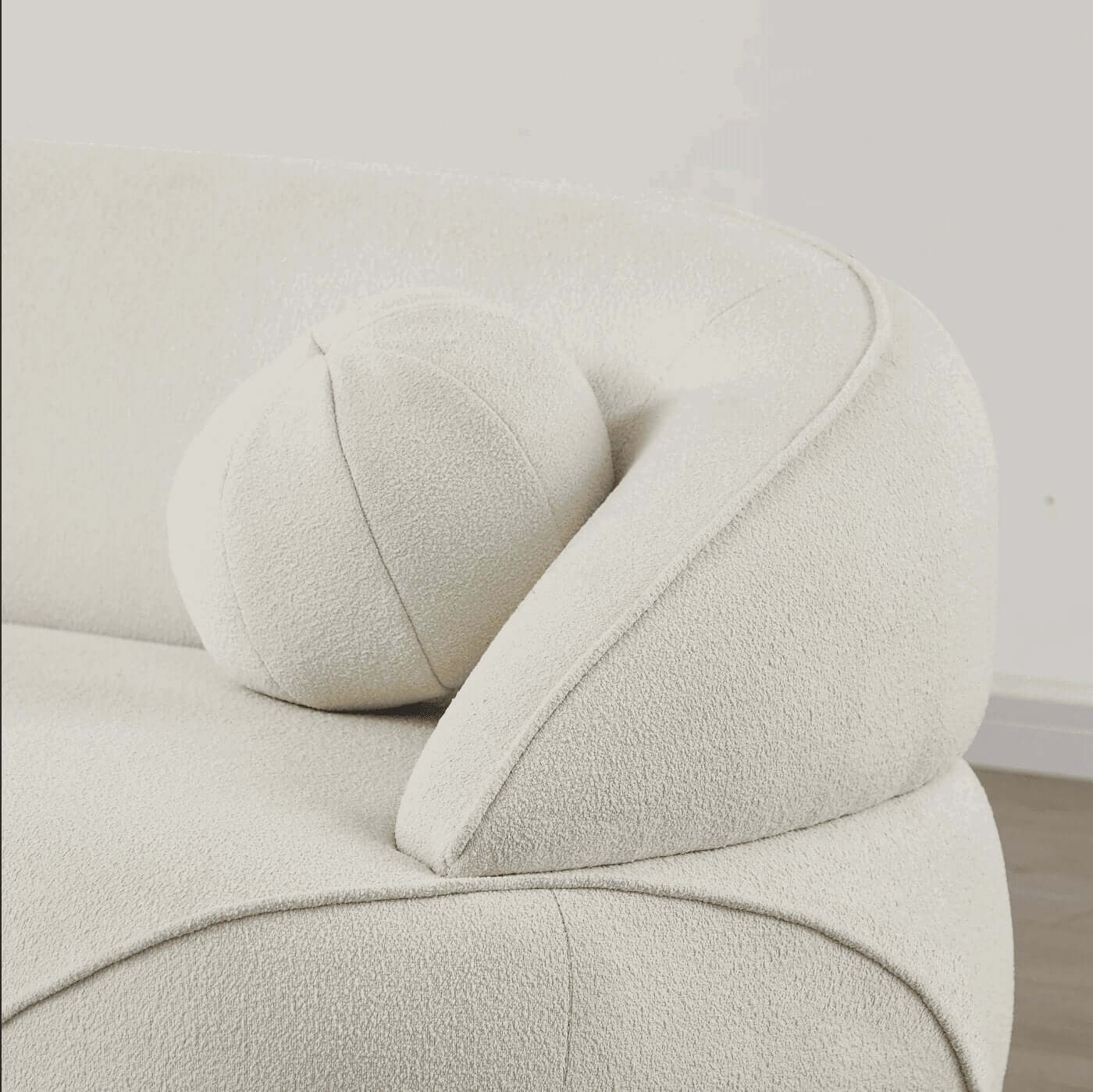 Modern Curved Boucle Sofa 84” (3 Colors) – Andrew Minimalist Sculptural Couch with plush arm and rounded pillow.