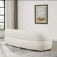 Modern Curved Boucle Sofa 84” (3 Colors) – Andrew Minimalist Sculptural Couch in a minimalist living room setting.