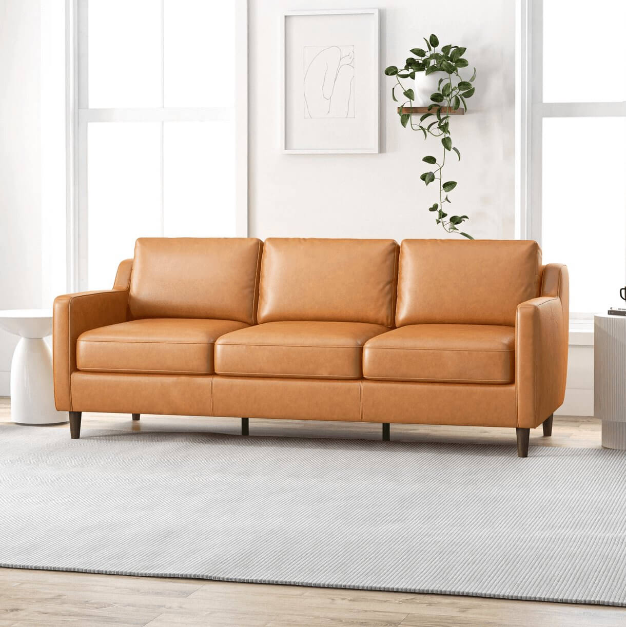 Modern Genuine Leather 3 Seat Sofa 81” – Cooper MCM Tan Leather Couch in a stylish living room setting.